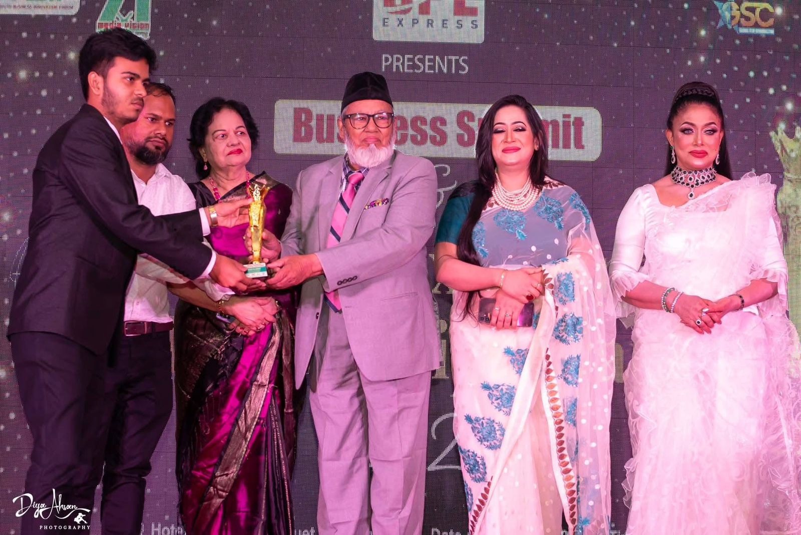 TeenX receiving Business Summit Award 2025